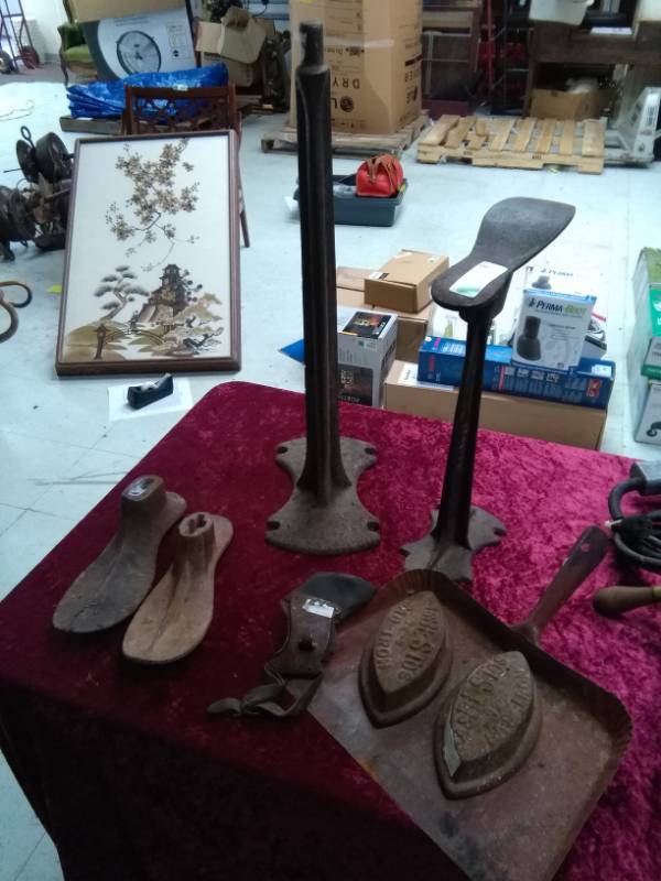 lot 1893 image: Vintage Cobbler Shoe Stands, Metal Dust Pan & 2 Sad Irons