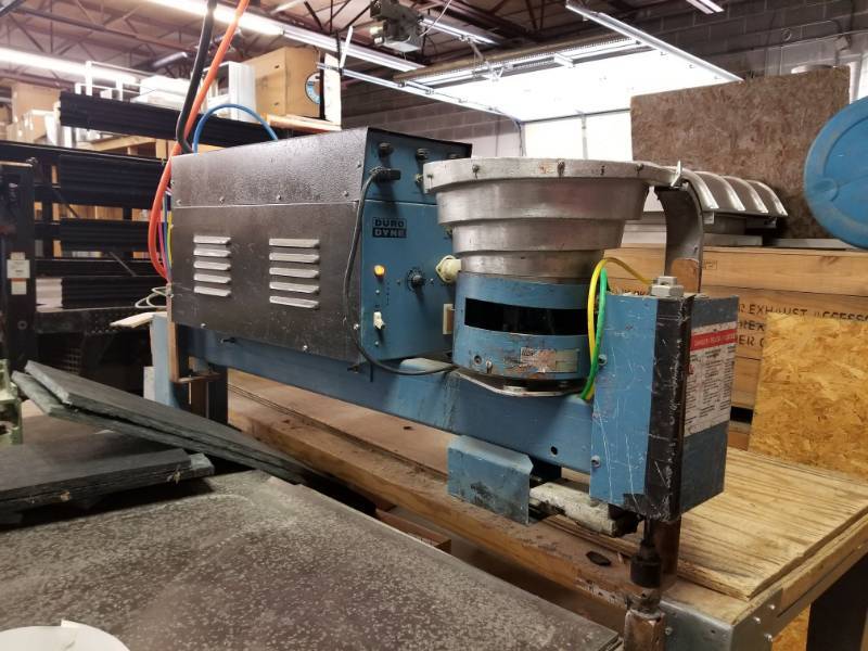 lot 2647 image: Duro Dyne Parts Vibration Machine