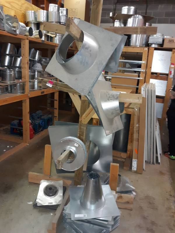 lot 2769 image: Air Duct Collars Stand included
