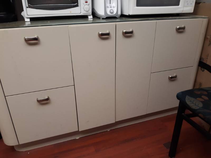 lot 2781 image: Breakroom Furniture, 2 buffet tables, 5 dining chairs, 2 Bookshelves, Desk with 2 drawers and cabinet,