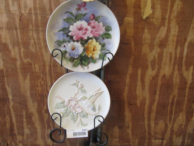 lot 2297 image: vintage plates with plate hanger