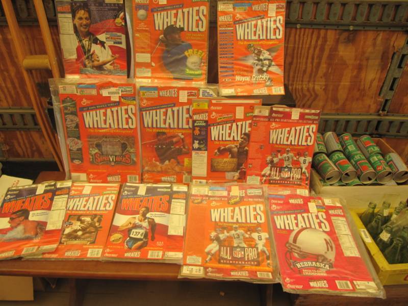lot 2298 image: 13 Vintage  Wheaties breakfast of champions boxes in plastic wrappers