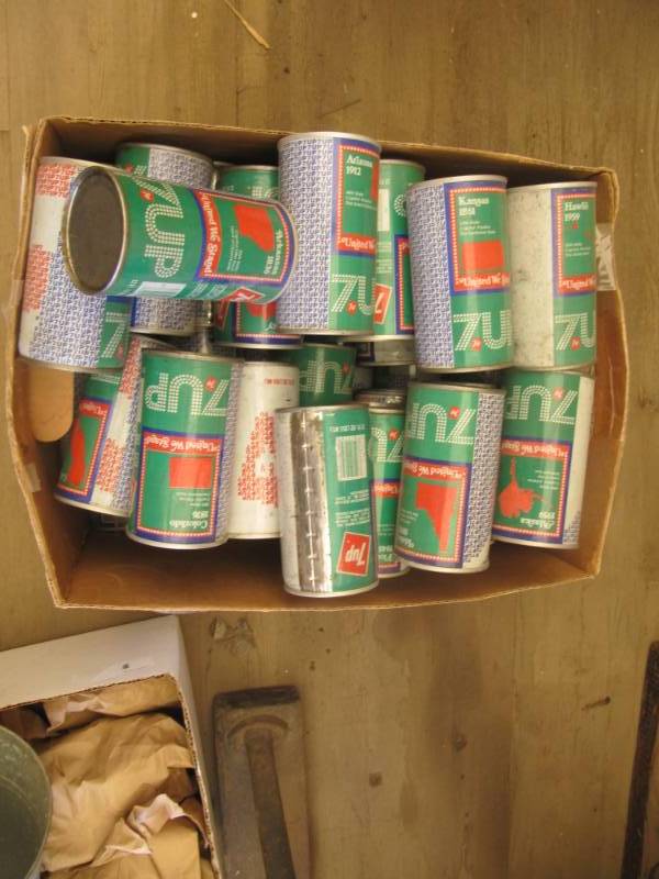 lot 2292 image: empty 7-up cans when put together creates sign United We Stand