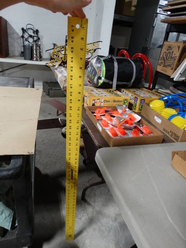 lot 74 image: 48 Swanson metal ruler.