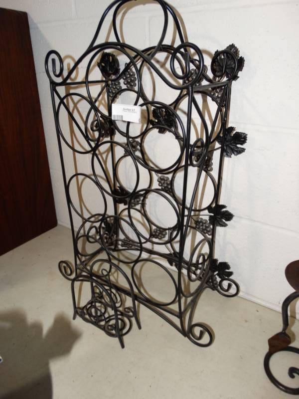 lot 92 image: Metal wine rack and small decor rack.