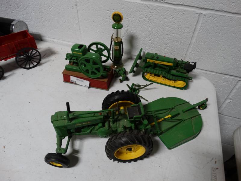 lot 99 image: Lot of John Deere die-cast tractors.