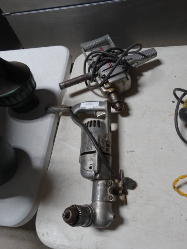 lot 140 image: Black & Decker drill and Zypher drill with chuck keys.