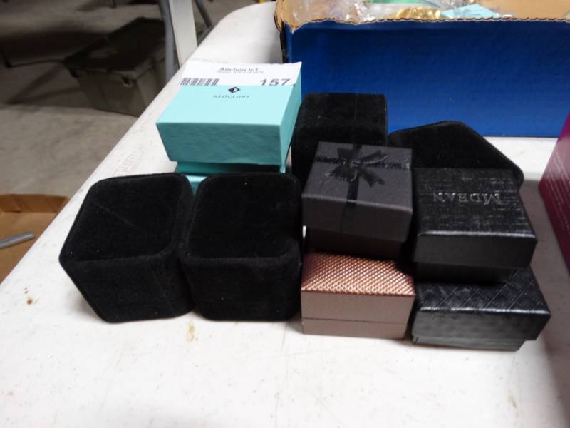 lot 157 image: Lot of costume jewelry rings in boxes.