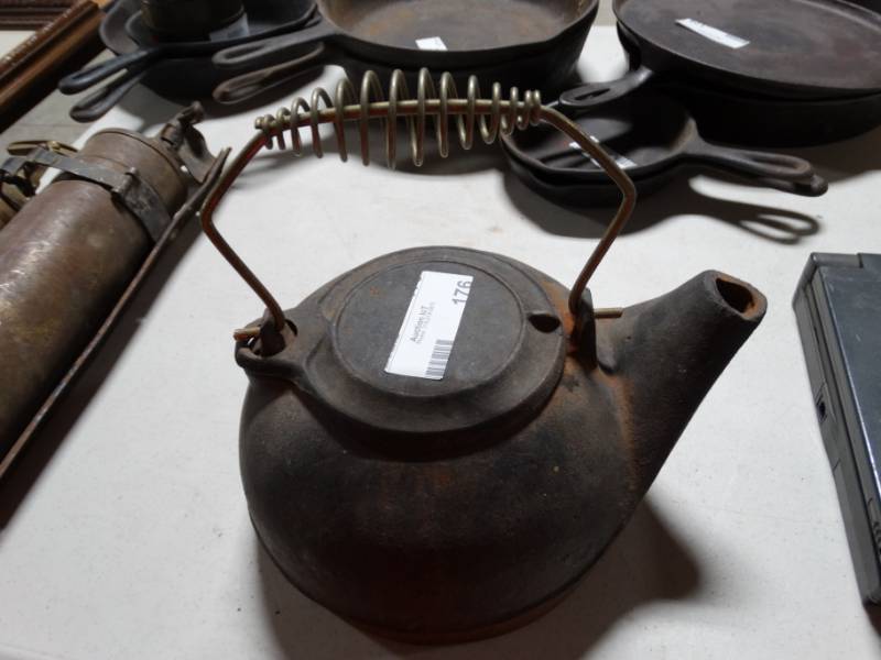 lot 176 image: Cast iron tea pot.