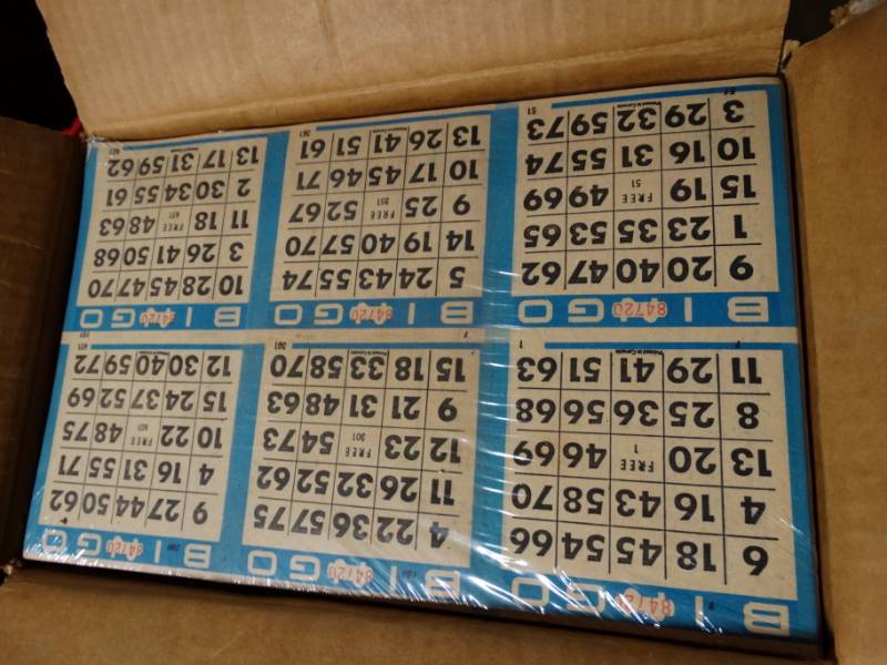 lot 191 image: 2 boxes of bingo sheets.