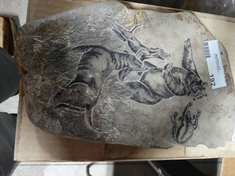 lot 192 image: Etched rock art signed by artist.