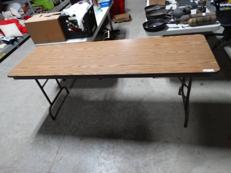 lot 200 image: Wood fold up table.