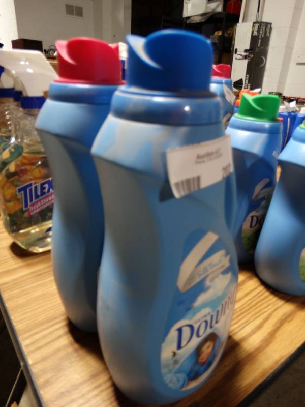 lot 202 image: Two 60 load bottles of Downy fabric softener.