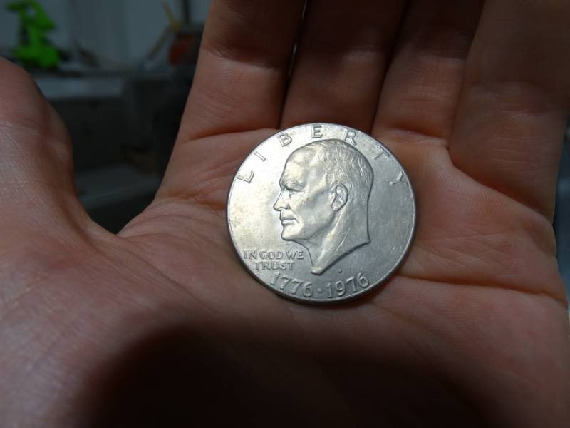 lot 221 image: Bicentennial Ike silver dollar.