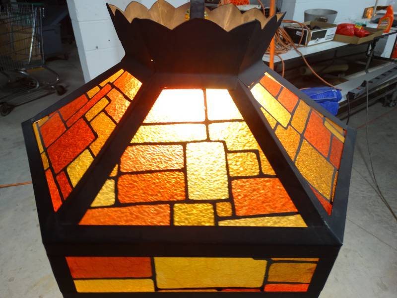 lot 223 image: Stained glass look-a-like plastic hanging light with metal frame made in Mexico.