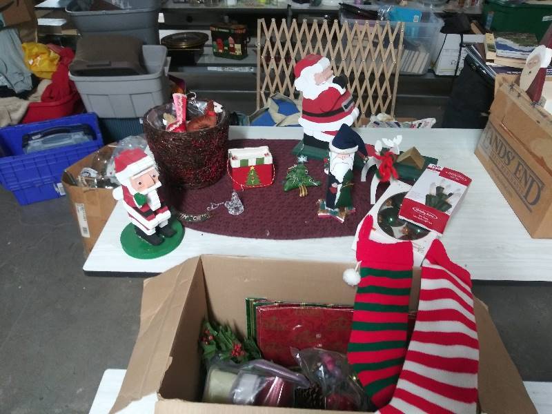 lot 2070 image: Wooden Santas, Christmas Stockings, Christmas Decor