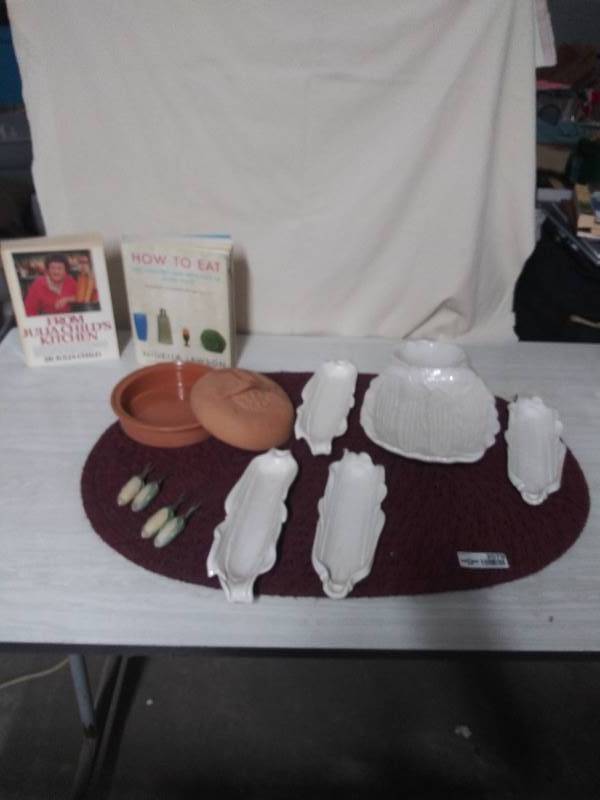 lot 2079 image: Recipe Books, Julia Childs, Earthenware Dish, Corn on the cob serving dish and individual corn on the cob dishes.