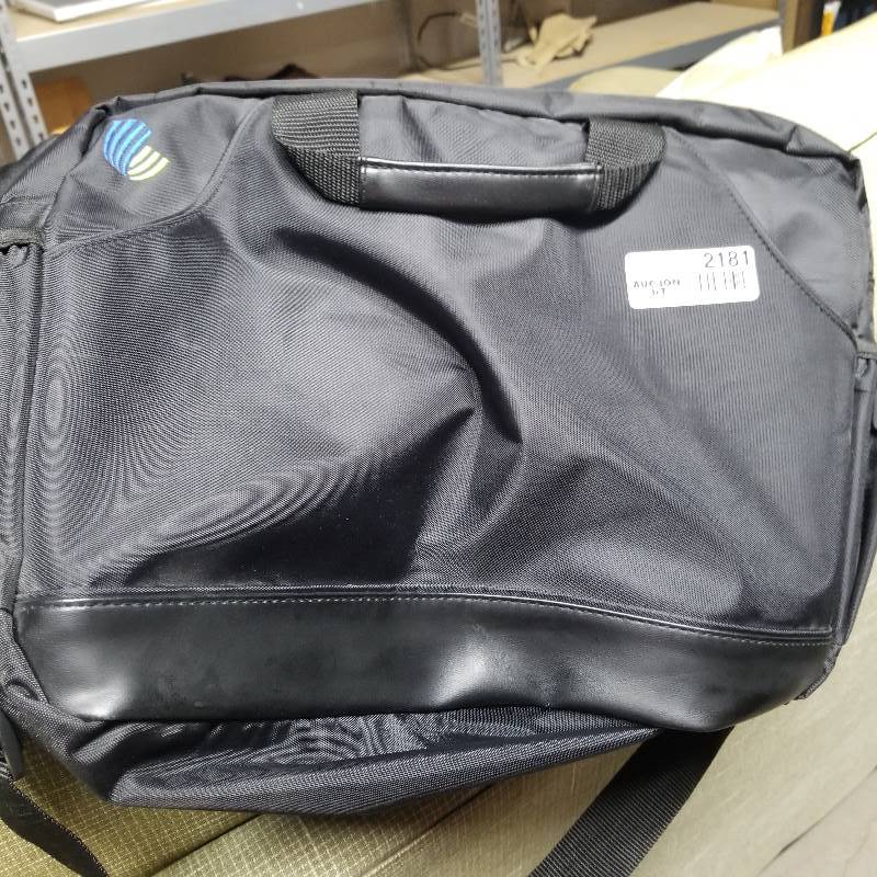 lot 2181 image: Soft side black brief case with tablet cover