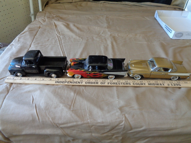 lot 7621 image: 1956 Ford Pickup, 1957 Chevy Bel Air and 1957 Studabaker