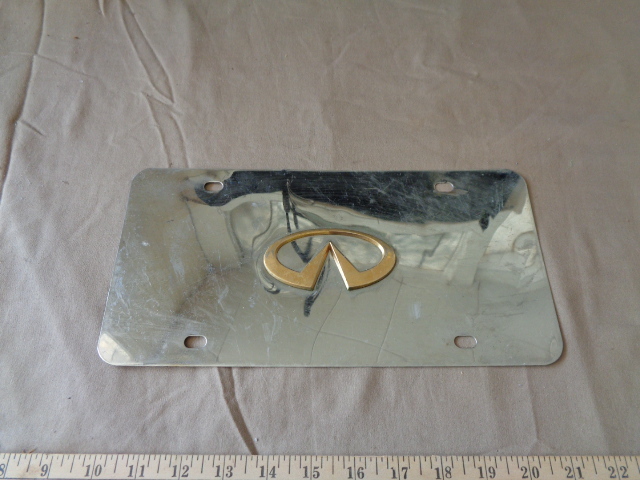 lot 7725 image: Metal Tag