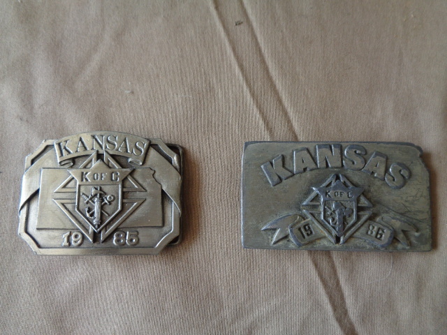 lot 7728 image: 1986 Siskyou Kansas and 1986 Limited Edition Kansas Belt Buckles