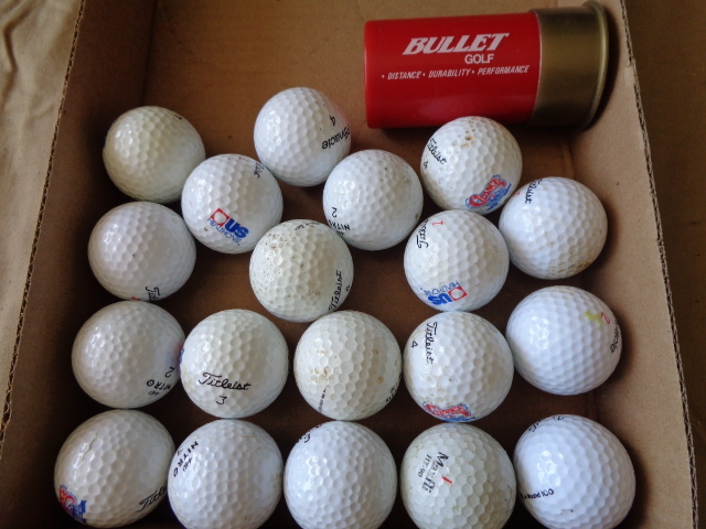lot 7736 image: 21 Golf Balls
