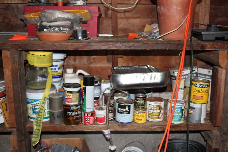 lot 1910 image: Home Improvement Lot  Stain, paint, primer, thin set mortar, wood filler�
