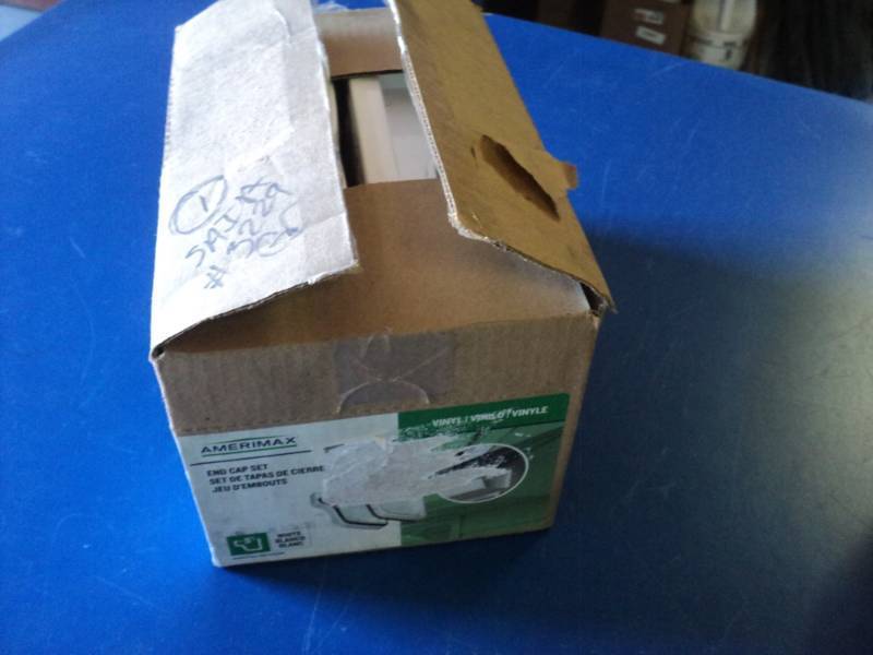 lot 9179 image: (1) box Amerimax End Cap set, white vinyl MO611, 14 pair per case