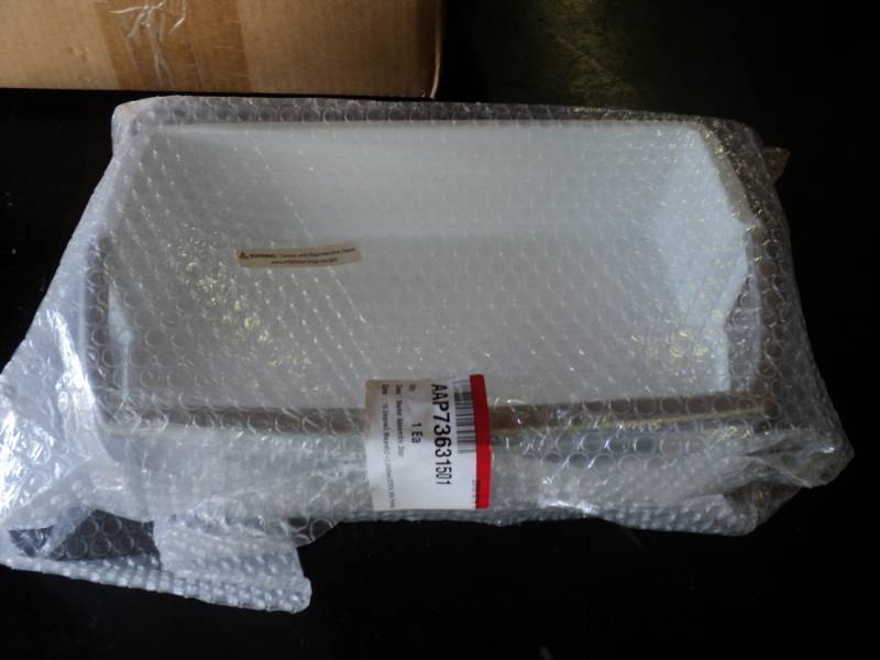 lot 9773 image: LG Service Parts Basket Assembly (Door ), AAP73631501, box is damaged but basket is not affected