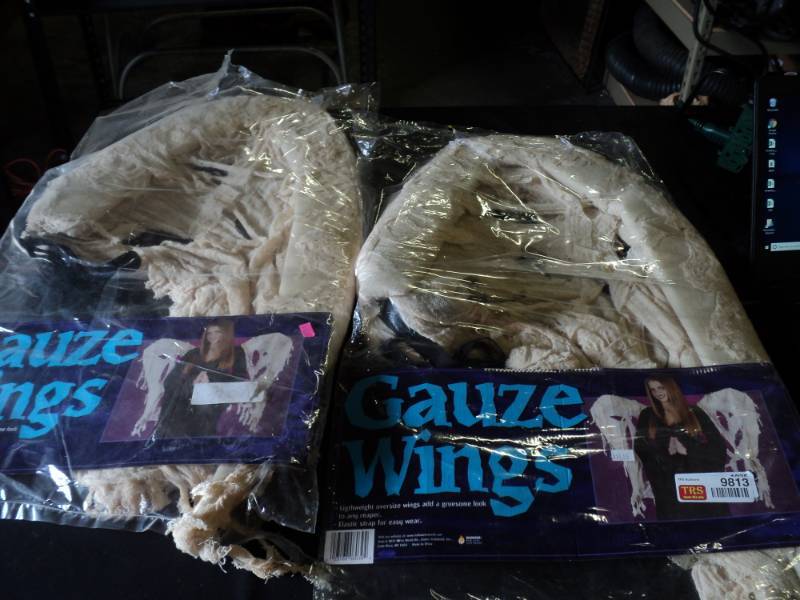 lot 9813 image: (2) pair Gauze Wings, Oversized, elastic strap for easy wear