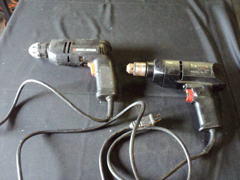 lot 9819 image: (2) ct lot corded drills, Black & Decker, Craftsman, both power on