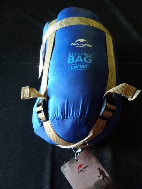 lot 9843 image: (1) Nature Hike Lightweight Sleeping bag LW180, approx 29 x 64