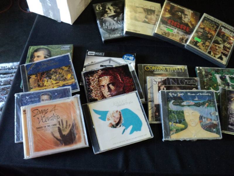 lot 9886 image: (16) ct mixed lot DVDs & CDs, mixed artists and genres