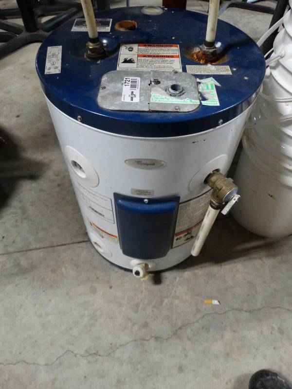 lot 1721 image: Whirpool 12 gallon electric hot water heater