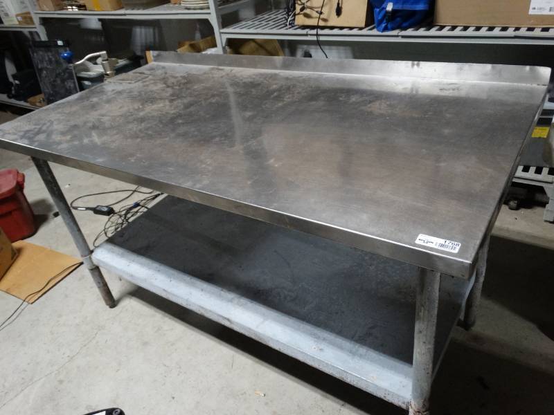 lot 1768 image: Stainless steel table w #10 can opener- 60 long x 30 deep x 34 tall