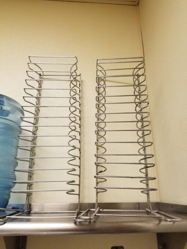 lot 6690 image: 2 Metal Pizza Holding Racks