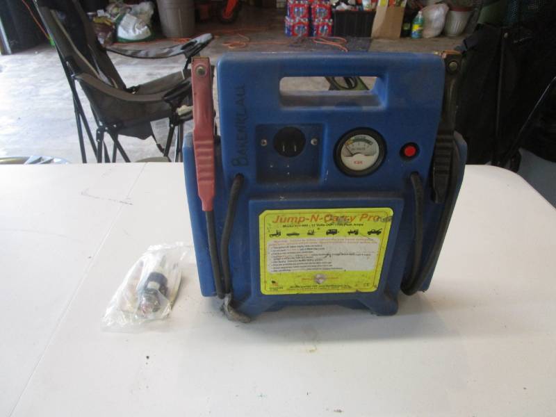 lot 7045 image: Jump-N-Carry Pro Model Pro660 12v