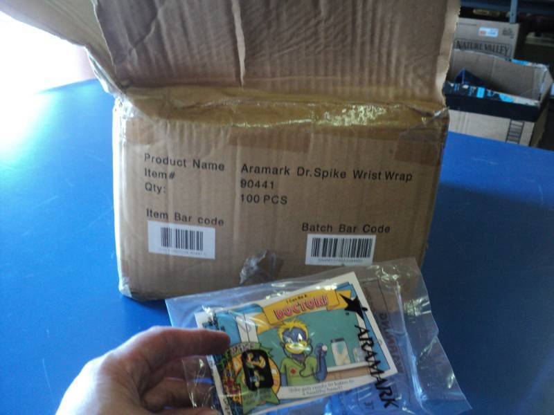 lot 9309 image: (1) box Aramark Dr. Spike Wrist Wrap, (100) per box