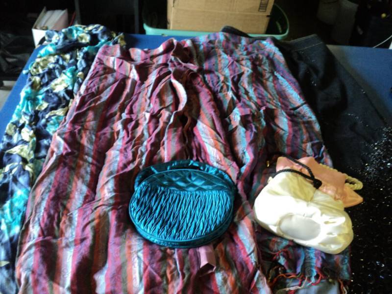 lot 9348 image: Mixed lot clothing and accessories sun dress, wrap around skirts, jean skirt, purses