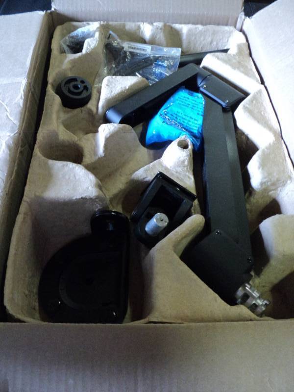 lot 9927 image: Innovative Brand tilt arm parts for model 7000 and Model 800, open box parts are incomplete