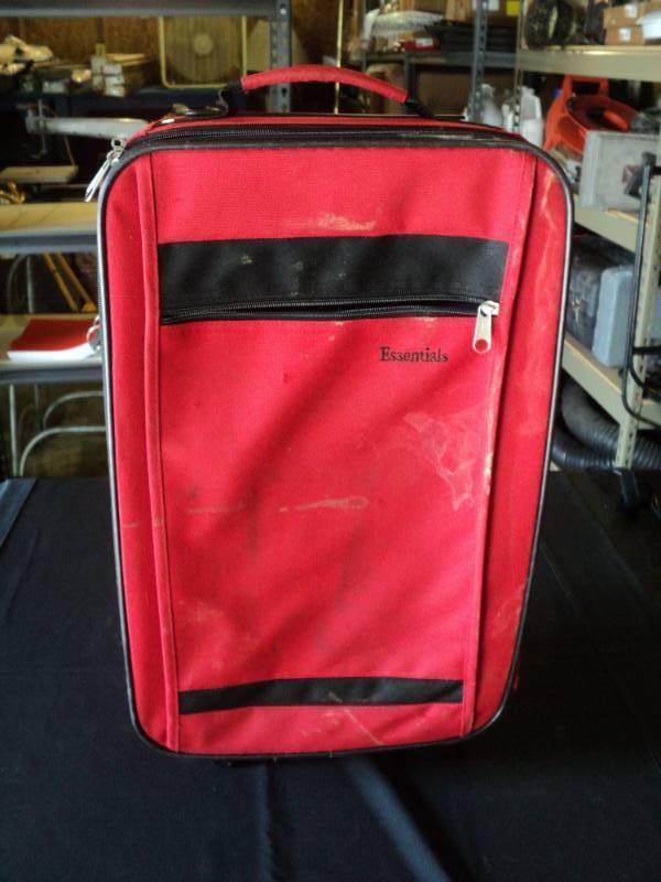 lot 9952 image: Essentials small red rolling suitcase, 12 x 19 x 6, used