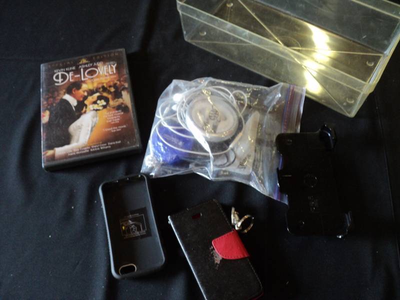 lot 9963 image: Mixed lot cell phone accessories and Cole Porter DVD