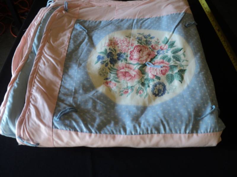 lot 9966 image: Handmade Nap quilt blue and pink, approx 64 x 102