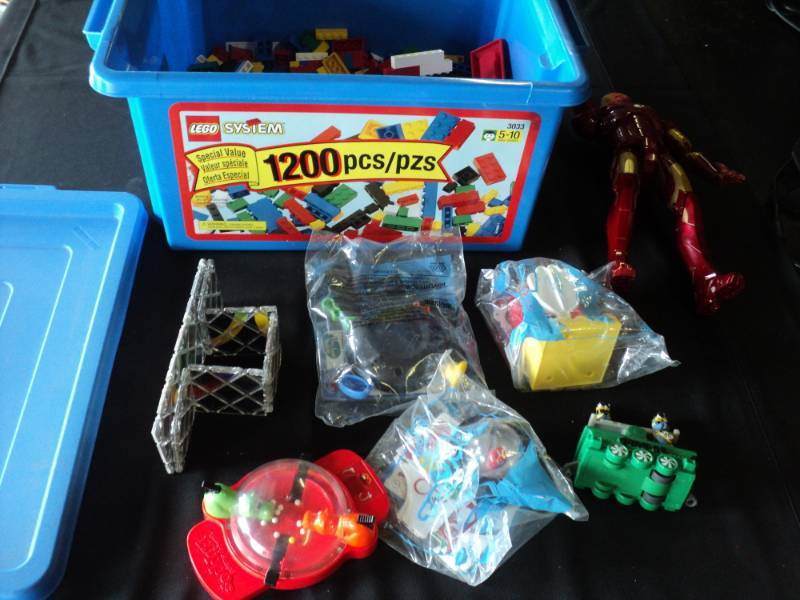 lot 10007 image: Plastic Lego tub with legos, small games and toys