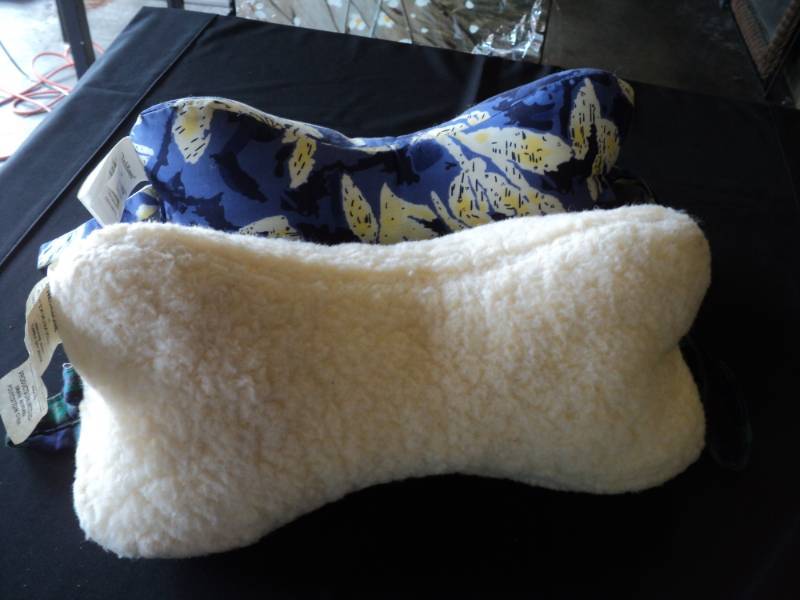 lot 10030 image: (2) ct lot Neck Bone Pillows