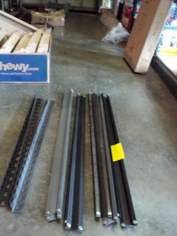 lot 10041 image: Hardware for 2- tier shelf, black & Gray, 36 x 36 x 30, includes (8) 36 braces, (4) 30 corners
