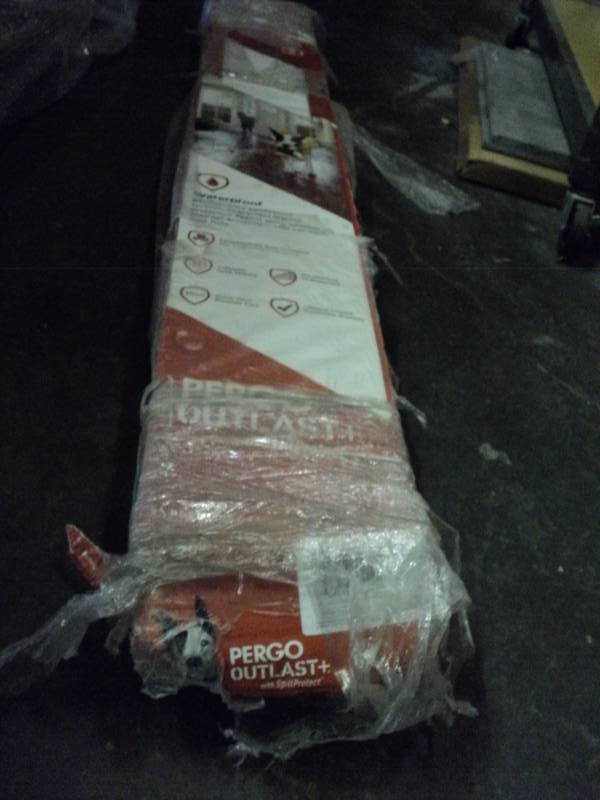 lot 10060 image: (1) box Pergo Laminate Flooring, (8) planks, 16.12 sq. ft, Auburn scraped Oak