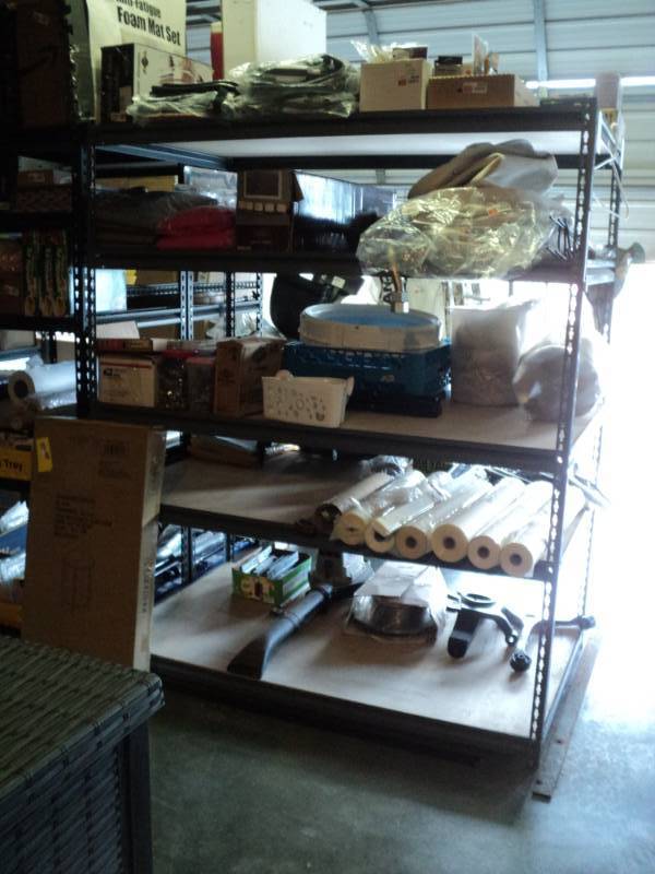lot 10075 image: 5-tier storage shelf, 36 x 5 x 6 tall, shelf has been pictured with contents, contents not included