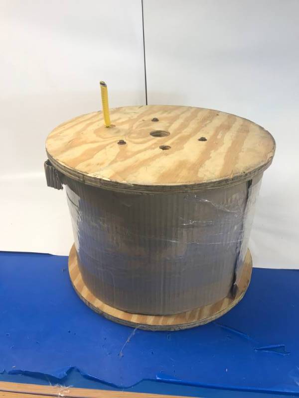 lot 3090 image: Spool of wire enclosure