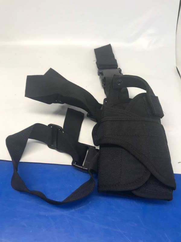 lot 3173 image: TRACTICAL HAND GUN HOLSTER
